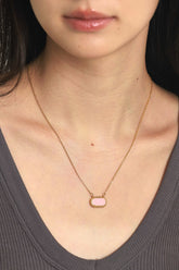 wearing Mini Cube Necklace